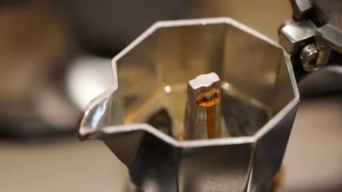 Slow motion steaming Moka Pot brewing coffee. Italian espresso maker Stock Footage 231707230