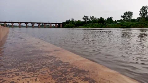 Slow motion Still view of Irwin bridge and Krishna river flowing water. Stock Footage 138527255
