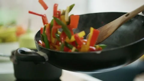 Slow Motion Stir Fry Vegetables Tossed in Wok – Vertical Cooking Food Video Stock Footage 328985167