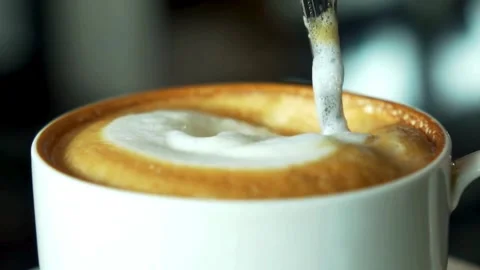 SLOW MOTION: Stirring Cappuccino Stock Footage 277002148