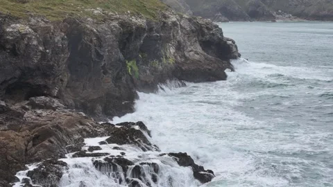 Slow motion Stormy dramatic waves exploding on Cornish coast near Port Stock Footage 255827501