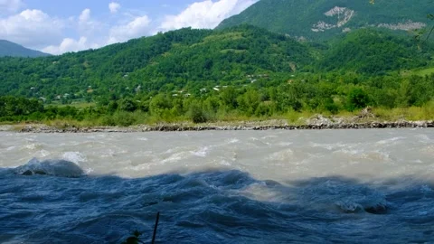 Slow motion of stormy mountain river. Beautiful mountain scenery in the Stock Footage 201180702