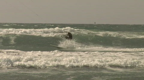 Slow Motion Strapless Kite Surfing Turn on Wave Video stock 684930