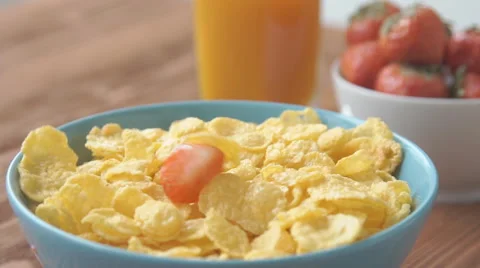 Slow-motion strawberry into milk Stock Footage 68952841