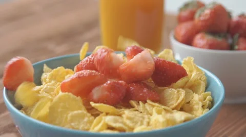 Slow-motion strawberry into milk Stock Footage 68952972
