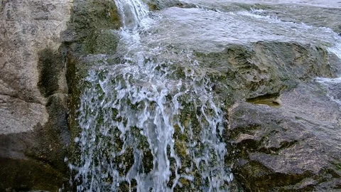 Slow motion of stream flowing over limestone Video stock 103632919