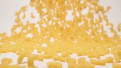 SLOW MOTION: Stream of pasta moving to a camera Stock Footage 70572528