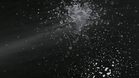 Slow motion. Streams of white paint fall into the center of a black background 库存影片 169433179