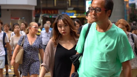 Slow motion of Streets crowded with people shopping Stock Footage 125164545