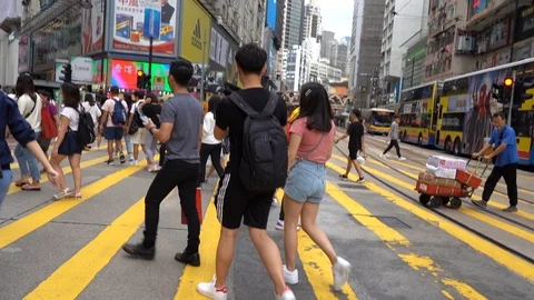 Slow motion of Streets crowded with people shopping Stock Footage 125165545