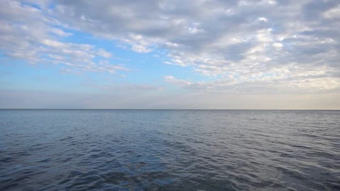 Slow motion submerging down underwater in smooth ocean waves at. Stock Footage 116909727