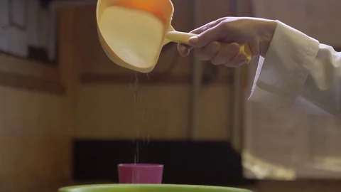 Slow motion of a sugar falling down Stock Footage 75059824