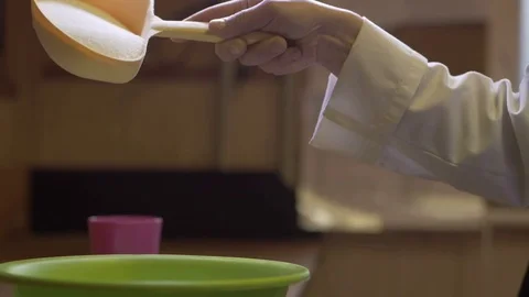 Slow motion of a sugar falling down Stock Footage 75059895