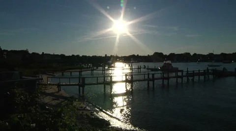 Slow Motion Sun Over Dock Stock Footage 7728300