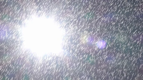 Slow motion of sunny thick shower on cloudless sky background with side sun Stock Footage 103594802