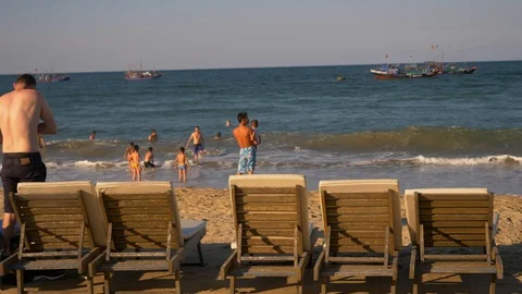 Slow motion sunset at an bang beach Stock Footage 96444604