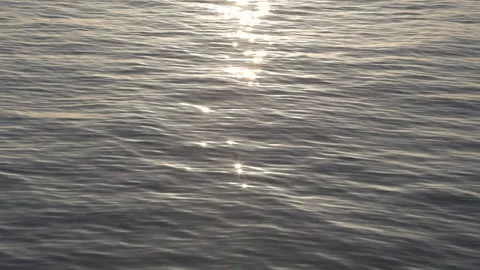 Slow motion sunset calm ocean water surface with sun sparkles reflection (01) Stock Footage 220149318