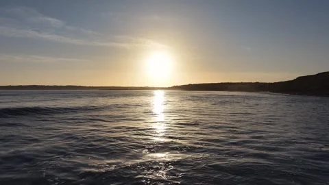 Slow Motion Sunset Over Ocean Waves Near Coastline in 4K 库存影片 332944493