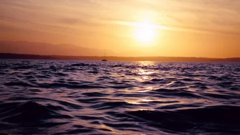 Slow motion sunset on the water Stock Footage 123392307