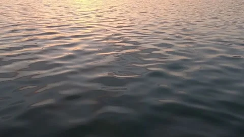 Slow motion sunset on the water Stock-Footage 182359620