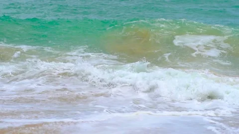 Slow motion surf or surf on sandy beach Stock Footage 132603299