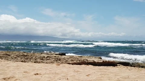 Slow Motion Surf with Plane Flying Maui Beach Stock Footage 201307152