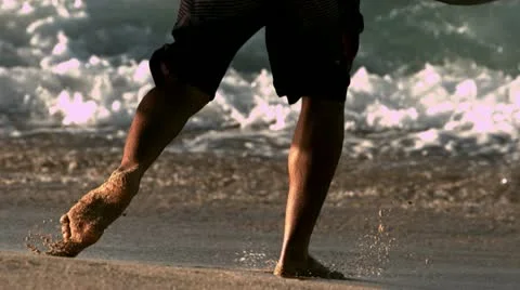 Slow motion surfer running on the beach in Hawaii Stock Footage 21830791