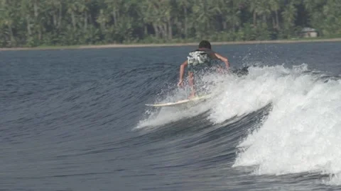 Slow Motion Surfing at Perfect Wave Saroke Beach, Nias, Indonesia Stock Footage 152348811