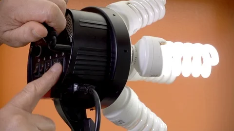 Slow motion: Switching on video lighting. Stock Footage 92464693