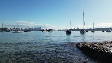 Slow Motion Sydney Harbour Hermit Beach sydney australia drone aerial boat a Stock Footage 246420104