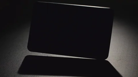 SLOW MOTION: Tablet PC falls on a floor Stock-Footage 99672907