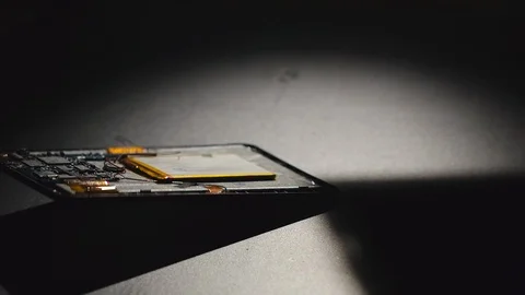SLOW MOTION: Tablet PC falls down and breaks down Stock Footage 99672951