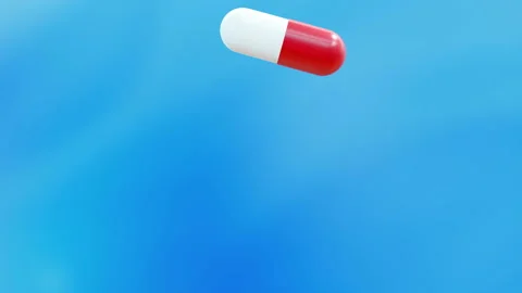 Slow motion tablets falling Stock Footage 102667353