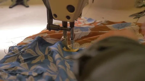 Slow Motion - Tailor uses the sewing machine Stock Footage 85048173