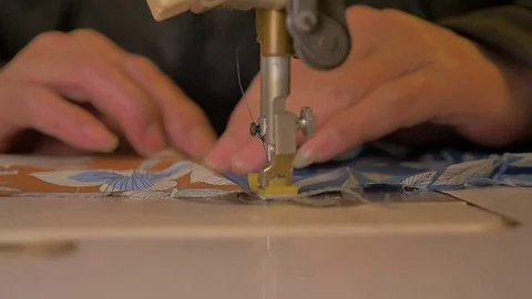 Slow Motion - Tailor uses the sewing machine Stock Footage 85048180