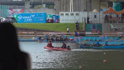 Slow motion of Taipei paddler preparing to row with paddle lifted Stock Footage 314205055