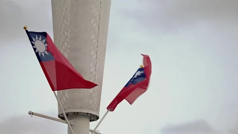 Slow motion of Taiwan flag blowing in the wind on a tall pole Stock Footage 314466154