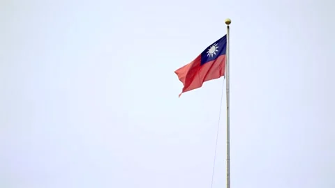Slow motion of Taiwan flag waving high on a tall pole Stock Footage 313497627