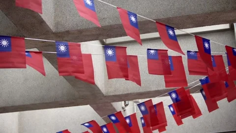 Slow motion of Taiwan flags arranged under a concrete roof Stock Footage 314466216