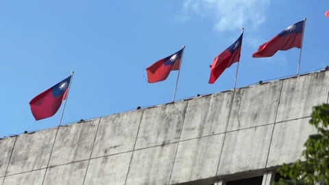 Slow motion of Taiwan flags on building rooftop Stock Footage 313497464