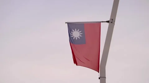 Slow motion of Taiwan flags displayed along city street Stock Footage 310853371
