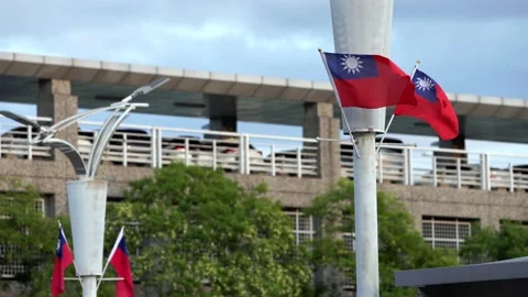 Slow motion of Taiwan flags with urban background Stock Footage 313007813