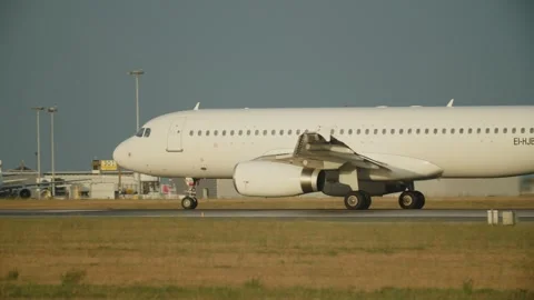 Slow-motion of takeoff a big passenger plane on the runway in airport. Acce.. Stock Footage 263109757