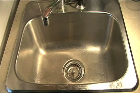Slow Motion Tap Water Stock Footage