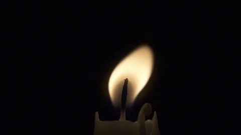 Slow motion taper candle flickering Stock Footage 101113496