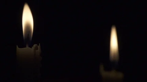 Slow motion taper candles flickering Stock Footage 101113154