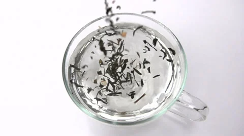 Slow motion tea in water Stock Footage 33802244