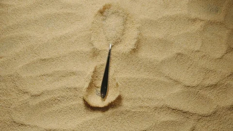 SLOW MOTION: Teaspoon with dry garlic grains falls onto a heap of garlic powder Stock Footage 107932767