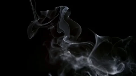 SLOW MOTION: Thin smoke lifts up on a dark background Stock Footage 70408082