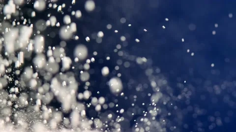 Slow motion of thousands of bubbles in the water on a blue background. Stock Footage 163221367